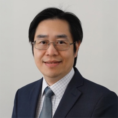 Portrait of Jimmy LI, wearing glasses, suit, and tie, smiling against a neutral background.