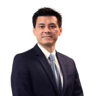 Portrait of Ir John CHAN in suit and tie