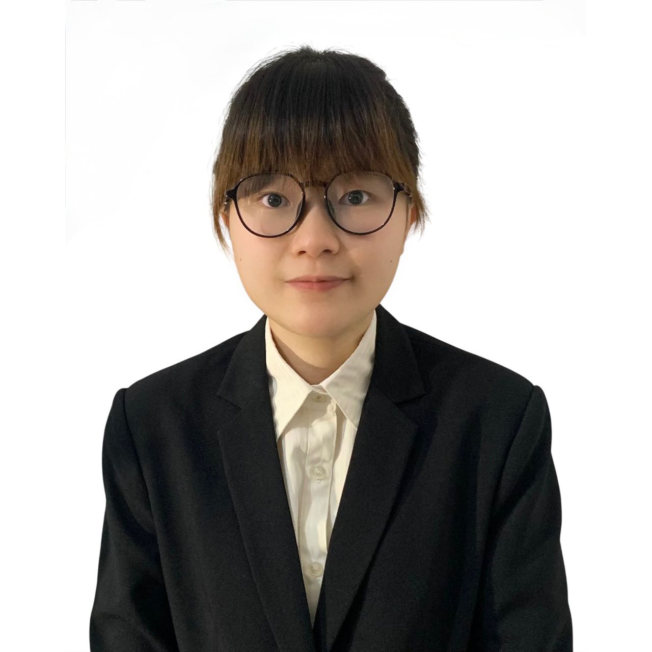 Portrait of Miss Wendy Cheung wearing glasses and a black blazer over a white shirt.