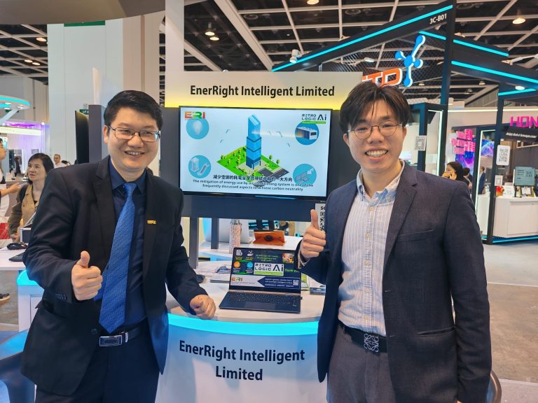 Two men giving thumbs up at EnerRight Intelligent Limited trade show booth.