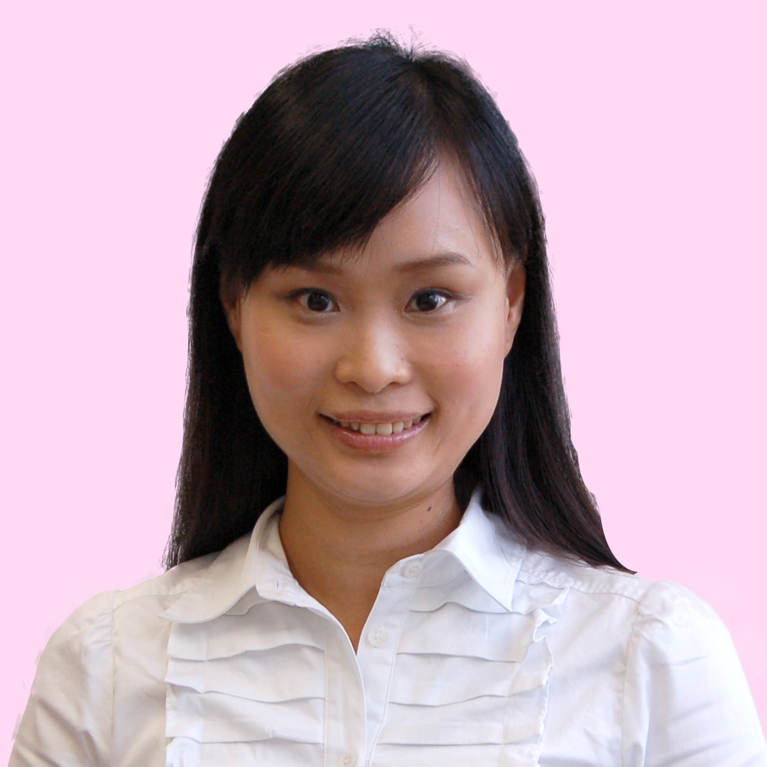 Portrait of a smiling woman with dark hair wearing a white blouse against a pink background.