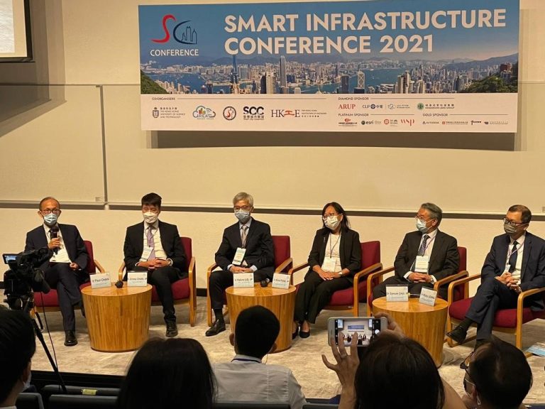 Panel discussion at Smart Infrastructure Conference 2021 with six speakers and audience members.