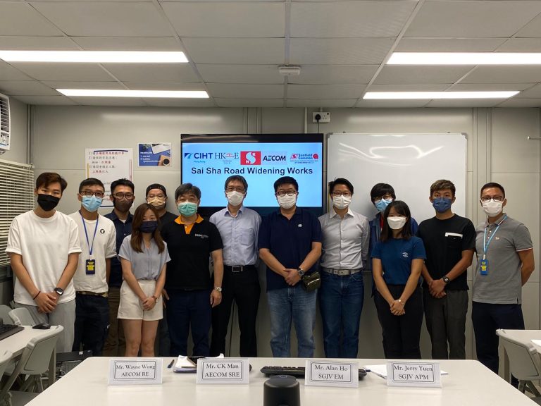 Group photo of professionals at Sai Sha Road Widening Works project meeting