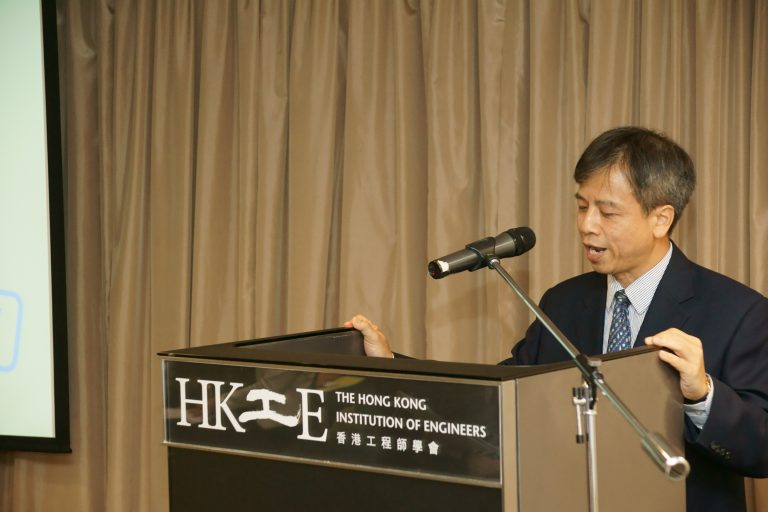Man speaking at podium for The Hong Kong Institution of Engineers