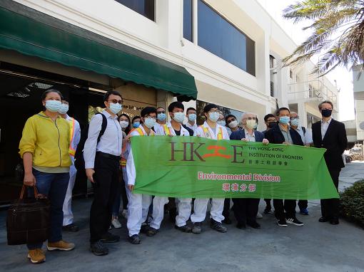 Group of people holding HKIE Environmental Division banner outside building