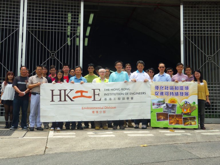 Engineers holding banner