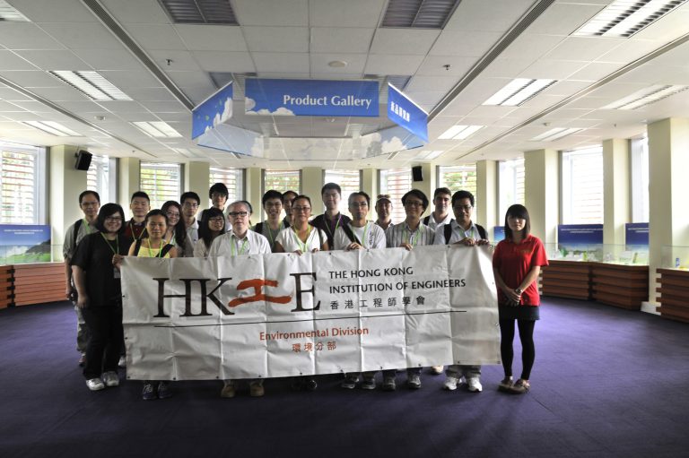 Engineers with banner in gallery