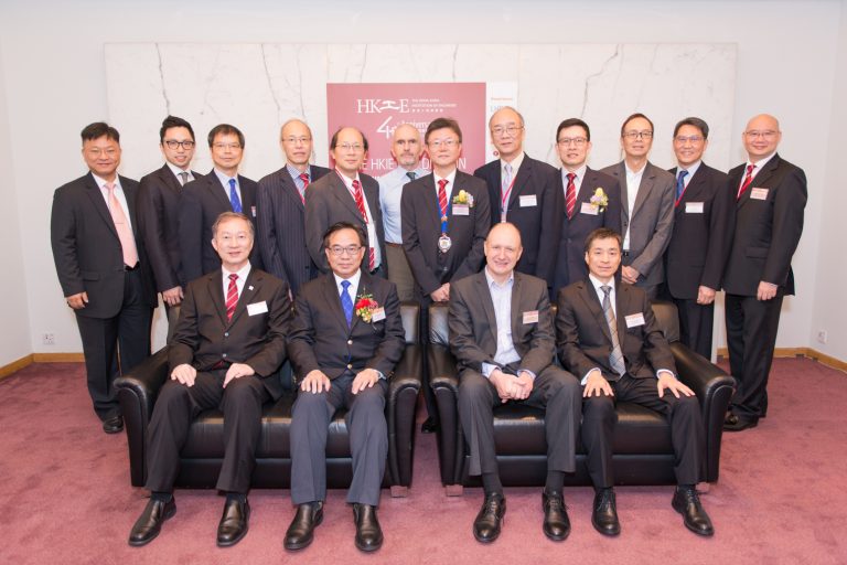Group of professionals posing for a formal event photo at the Hong Kong Institution of Engineers 4th Anniversary.