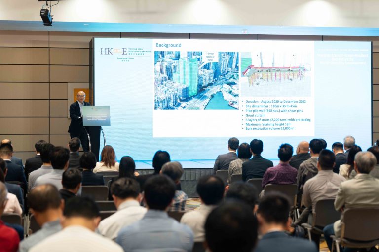 Speaker presenting at HKIE geotechnical division seminar on smart city development.