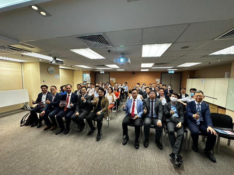 People in a room giving thumbs up