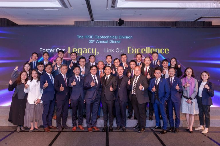 Group of professionals posing with thumbs up at HKIE Geotechnical Division 30th Annual Dinner