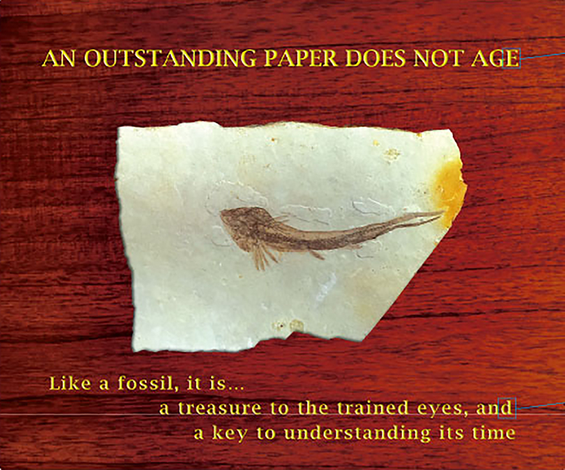 Fossilized fish on stone slab, with text about enduring value of quality paper.