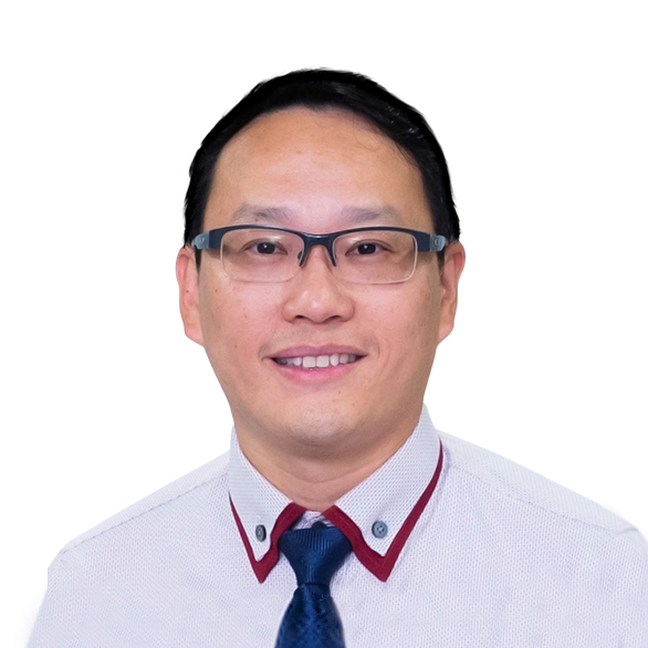 Portrait of a smiling man wearing glasses, a light shirt, and a blue tie.