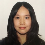 Portrait of Shirley Leung Cheuk Lam, smiling with dark hair against a plain background.