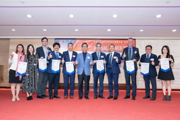 Group of award recipients posing with certificates at HKIE Annual Dinner 2023