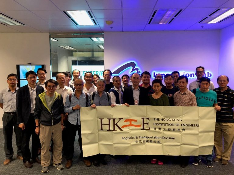 Group of engineers holding banner for Hong Kong Institution of Engineers Logistics & Transportation Division
