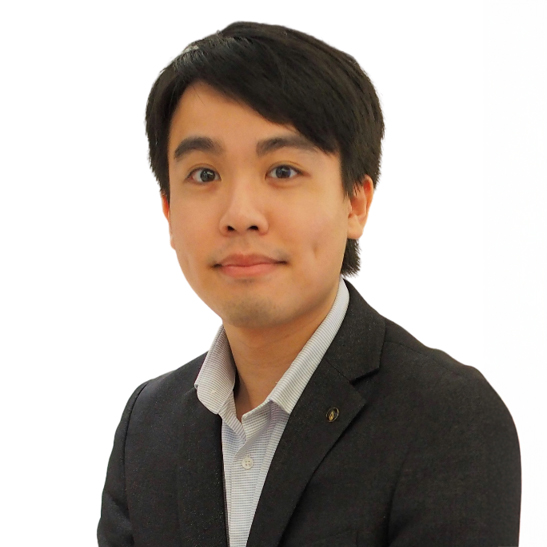 Portrait of Ferris Poon in business attire against a white background