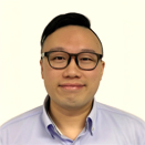 Portrait of Ir Dixon PANG Yik Man, wearing glasses and a light blue collared shirt.