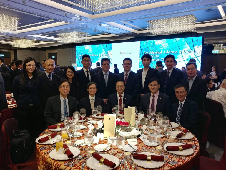 Group photo at HKIE Presidential Address & Dinner 2018, formal attendees posing at dining table.