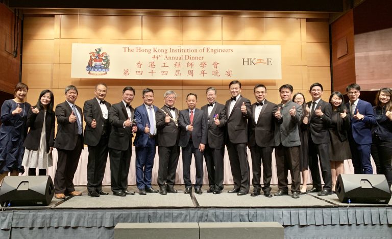 Group of professionals posing with thumbs up at HKIE 44th Annual Dinner event.