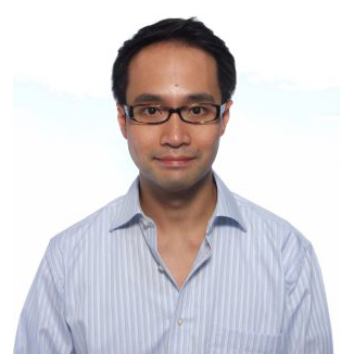 Portrait of a man with glasses wearing a striped shirt