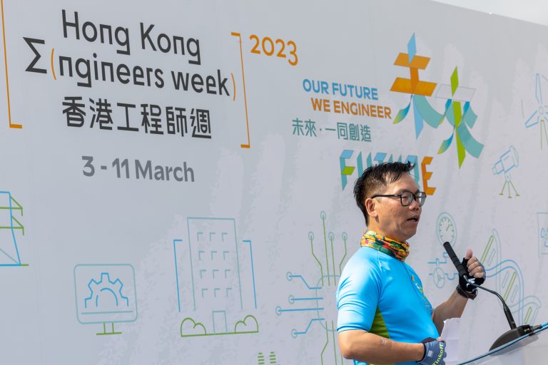 Man speaking at Hong Kong Engineers Week 2023 event backdrop