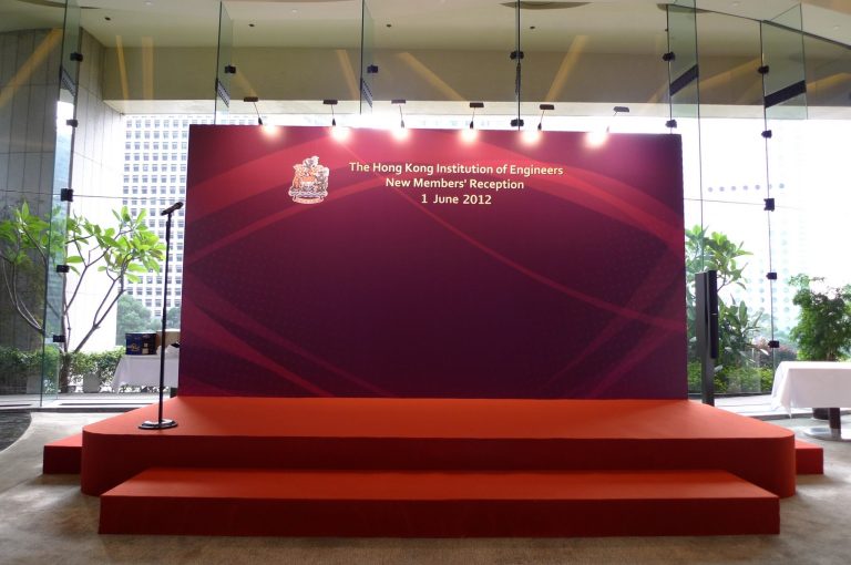 Red stage with backdrop for Hong Kong Institution of Engineers New Members' Reception on 1 June 2012.