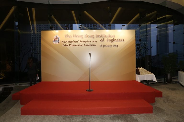 Stage with red carpet and microphone for Hong Kong Institution of Engineers event.
