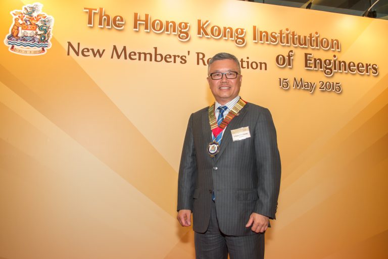 Man in suit with medal at Hong Kong Institution of Engineers new members' reception on May 15, 2015.